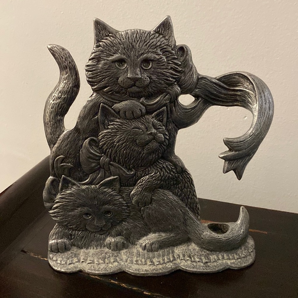 Vintage pewter cat sculpture that can hold a candle
